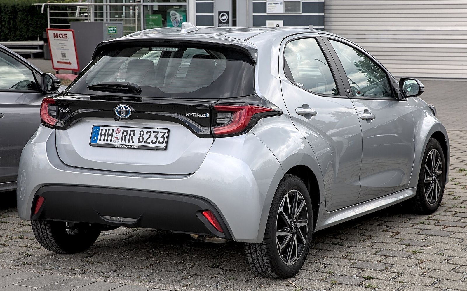 Toyota Yaris Hatchback — Silver Toyota Yaris hatchback rental car, rear three-quarter view